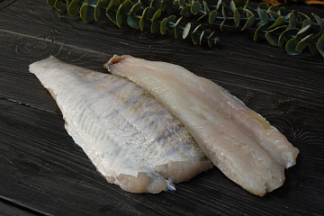Фото Судак филе на коже 400+(коробка 10кг)
